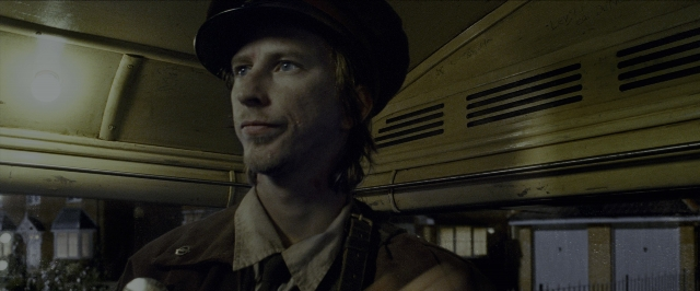 Medium shot frame from Harry Potter and the Prisoner of Azkaban — standing, room, hat
