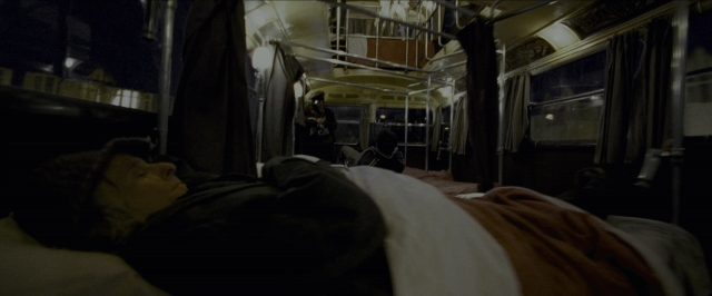 Wide shot frame from Harry Potter and the Prisoner of Azkaban — car, night, face