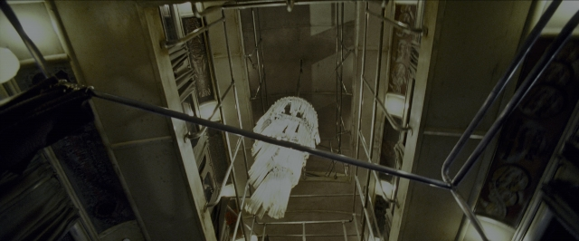 Wide shot frame from Harry Potter and the Prisoner of Azkaban — bird, building