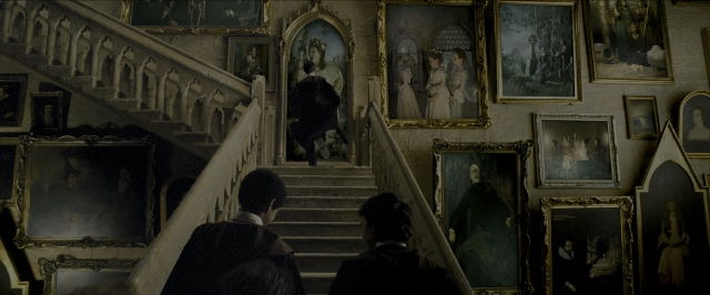 Wide shot frame from Harry Potter and the Prisoner of Azkaban — standing, room, dress