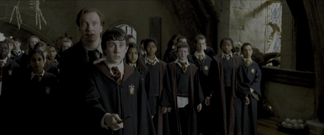 Wide shot frame from Harry Potter and the Prisoner of Azkaban — book, standing, room