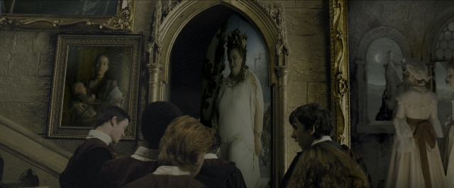 Wide shot frame from Harry Potter and the Prisoner of Azkaban — room, dialogue, coat