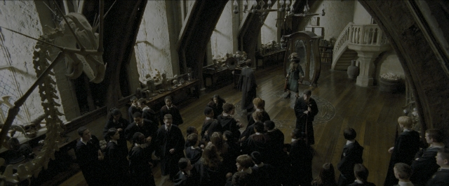Wide shot frame from Harry Potter and the Prisoner of Azkaban — standing, room, dialogue