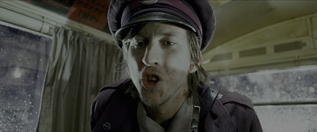 Wide shot frame from Harry Potter and the Prisoner of Azkaban — room, hat, hair