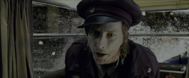 Medium shot frame from Harry Potter and the Prisoner of Azkaban — sitting, face, train