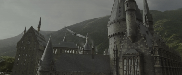 Wide shot frame from Harry Potter and the Prisoner of Azkaban — tower, bird, castle