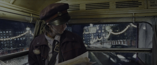 Wide shot frame from Harry Potter and the Prisoner of Azkaban — sitting, face, train