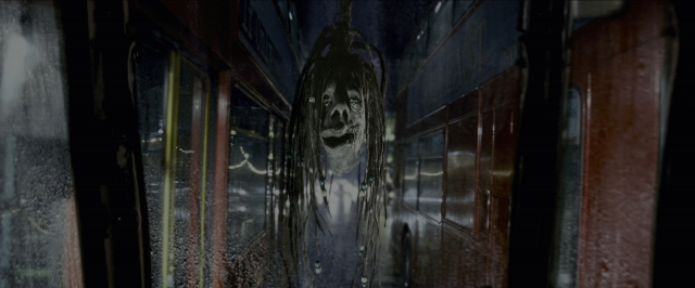 Wide shot frame from Harry Potter and the Prisoner of Azkaban — car, face, hair