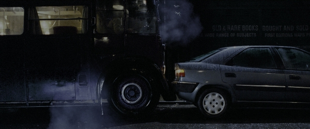 Wide shot frame from Harry Potter and the Prisoner of Azkaban — street, car, night
