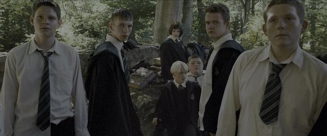 Wide shot frame from Harry Potter and the Prisoner of Azkaban — standing, person, human face