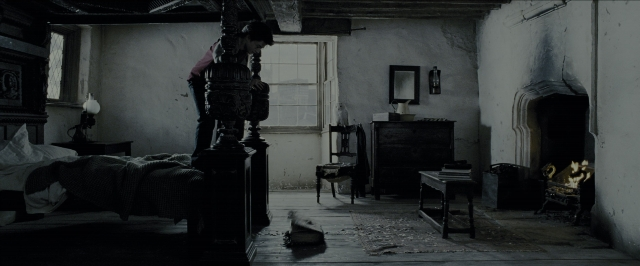 Wide shot frame from Harry Potter and the Prisoner of Azkaban — standing, room, bed