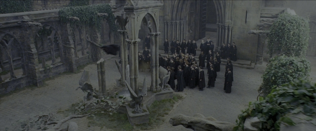 Wide shot frame from Harry Potter and the Prisoner of Azkaban — standing, bird, person