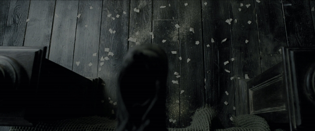 Wide shot frame from Harry Potter and the Prisoner of Azkaban — room, footwear