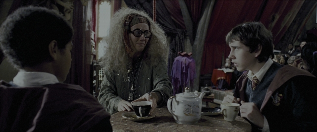 Wide shot frame from Harry Potter and the Prisoner of Azkaban — sitting, plate, room