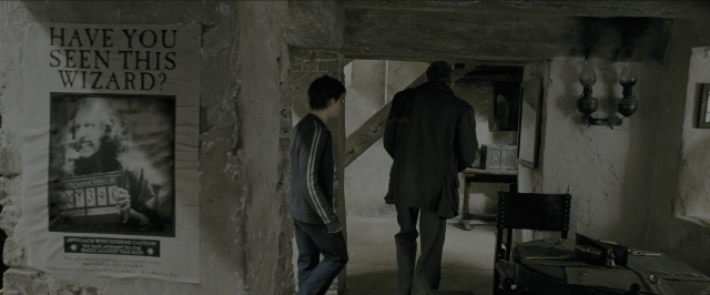 Wide shot frame from Harry Potter and the Prisoner of Azkaban — standing, room, chair