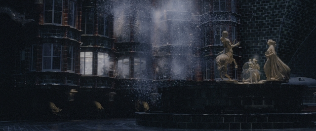 Wide shot frame from Harry Potter and the Order of the Phoenix — standing, night, water