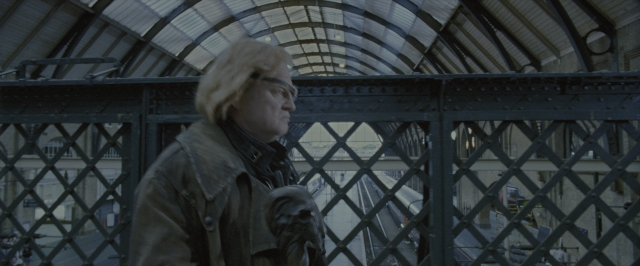 Wide shot frame from Harry Potter and the Order of the Phoenix — standing, walking, face