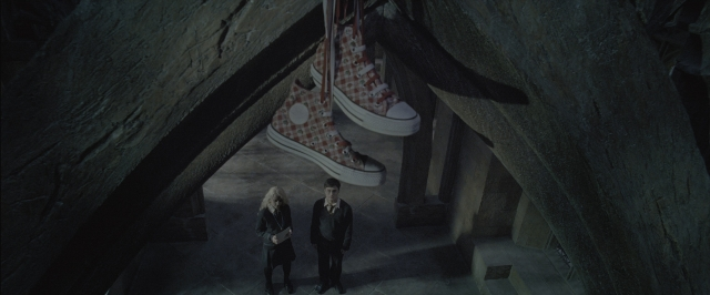 Wide shot frame from Harry Potter and the Order of the Phoenix — people, action, standing