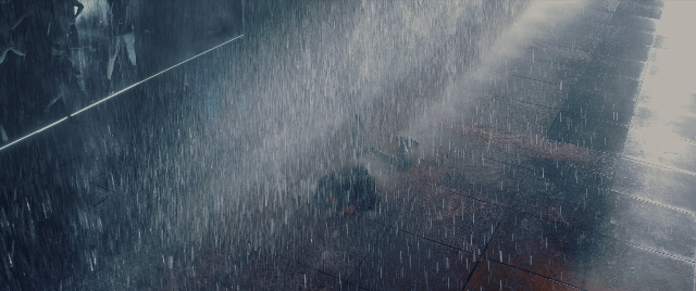 Wide shot frame from John Wick: Chapter 4 — walking, street, water
