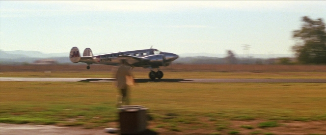 Frame from Man on the Moon — airplane