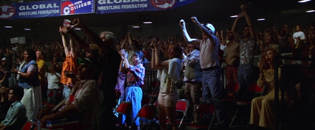 Wide shot frame from Man on the Moon — people, action, show