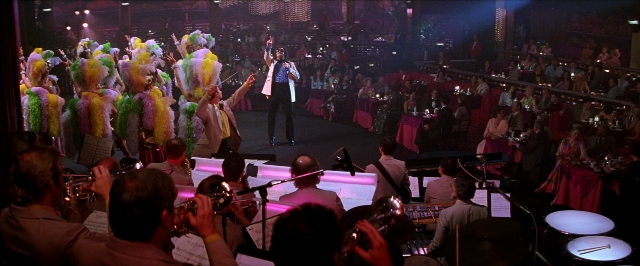 Wide shot frame from Man on the Moon — people, action, show