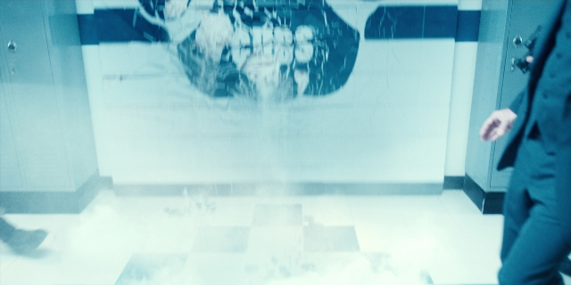 Wide shot frame from Stranger Things — walking, suit, smoke