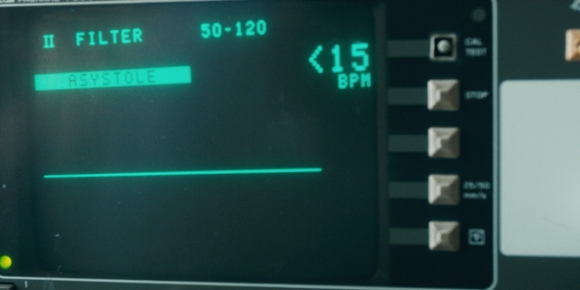 Wide shot frame from Stranger Things — digital clock