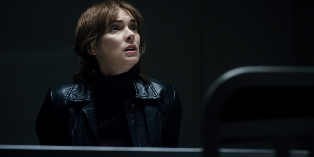 Frame from Stranger Things — standing, room, jacket