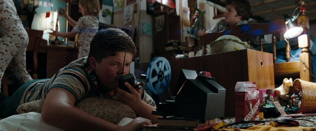 Wide shot frame from Super 8 — room, bed, furniture