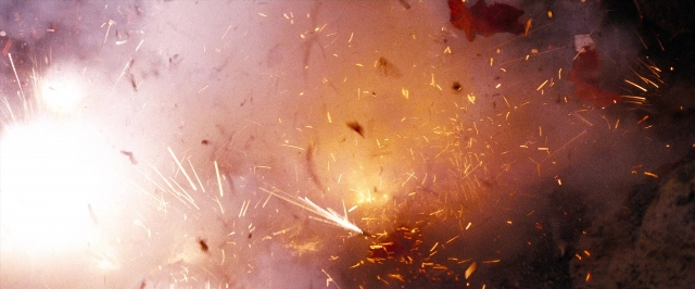 Frame from Super 8 — fire, night, fish