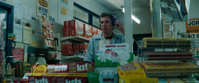 Wide shot frame from Super 8 — people, action, dialogue