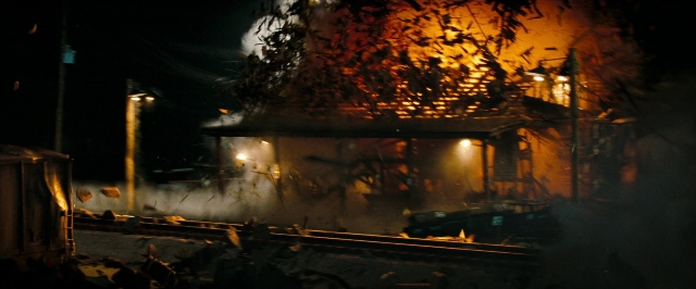 Frame from Super 8 — fire, night, train