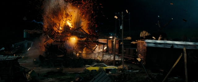 Frame from Super 8 — room, fire, car