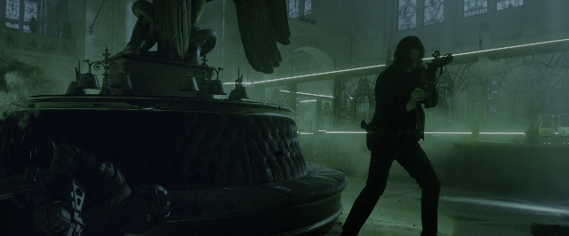 Wide shot frame from John Wick: Chapter 3 - Parabellum — standing, room, table