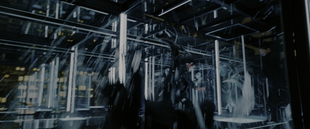 Wide shot frame from John Wick: Chapter 3 - Parabellum — walking, room, glass