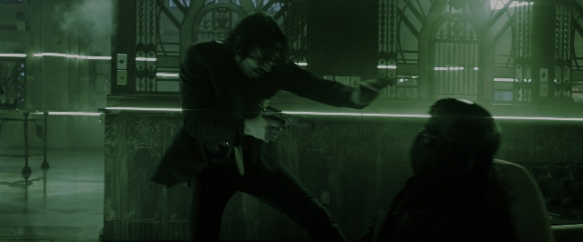Wide shot frame from John Wick: Chapter 3 - Parabellum — standing, hat, coat