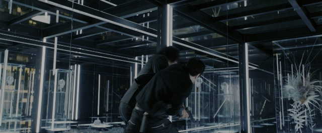 Wide shot frame from John Wick: Chapter 3 - Parabellum — standing, room, glass