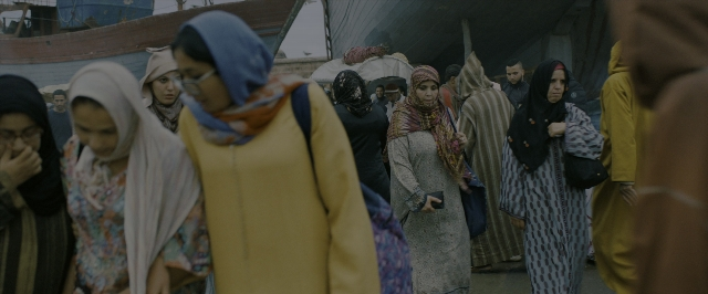 Wide shot frame from John Wick: Chapter 3 - Parabellum — walking, street, person
