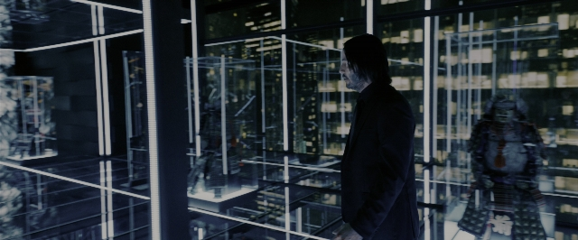 Wide shot frame from John Wick: Chapter 3 - Parabellum — standing, coat, night