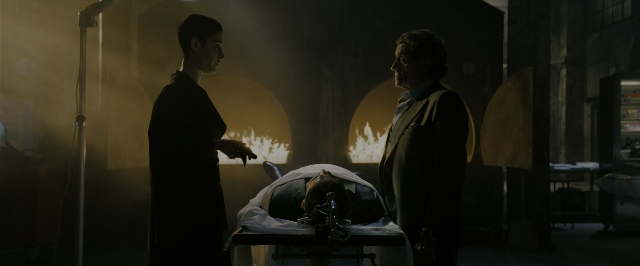 Wide shot frame from John Wick: Chapter 3 - Parabellum — standing, room, table