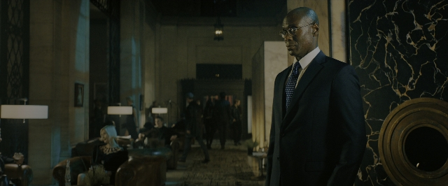 Wide shot frame from John Wick: Chapter 3 - Parabellum — sitting, standing, room