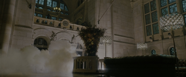 Wide shot frame from John Wick: Chapter 3 - Parabellum — couch, lamp, fountain