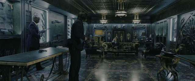 Wide shot frame from John Wick: Chapter 3 - Parabellum — sitting, standing, room