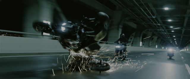 Wide shot frame from John Wick: Chapter 3 - Parabellum — street, night, person