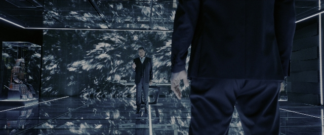 Wide shot frame from John Wick: Chapter 3 - Parabellum — sitting, walking, room