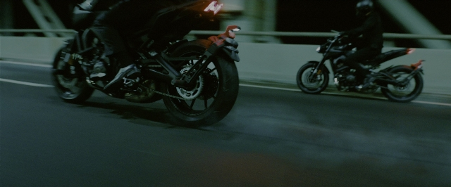 Frame from John Wick: Chapter 3 - Parabellum — hat, night, motorcycle