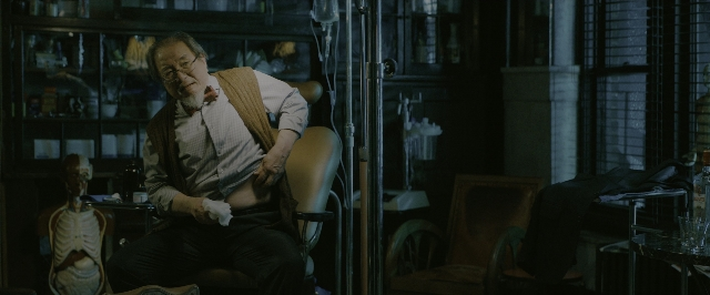 Wide shot frame from John Wick: Chapter 3 - Parabellum — sitting, room, table