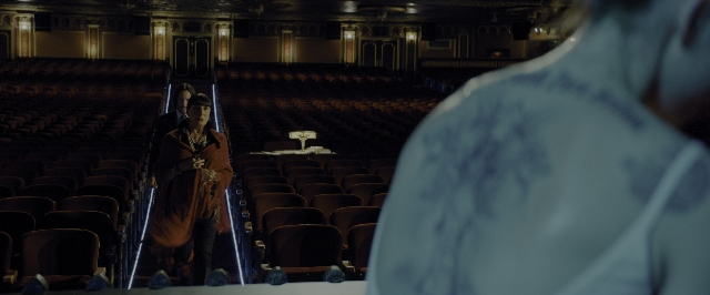 Wide shot frame from John Wick: Chapter 3 - Parabellum — standing, dialogue, person