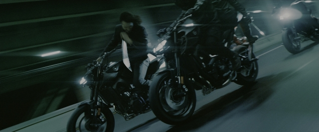 Wide shot frame from John Wick: Chapter 3 - Parabellum — street, night, motorcycle